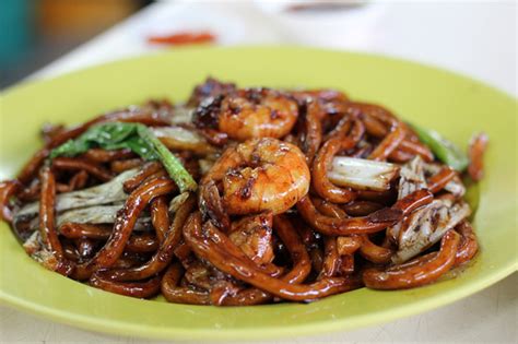  Hokkien Mee: Seuraa Sydämeesi Kermakasta Chili-Kastikkeesta Mausteiseen Umiin Lihan Herkulle!